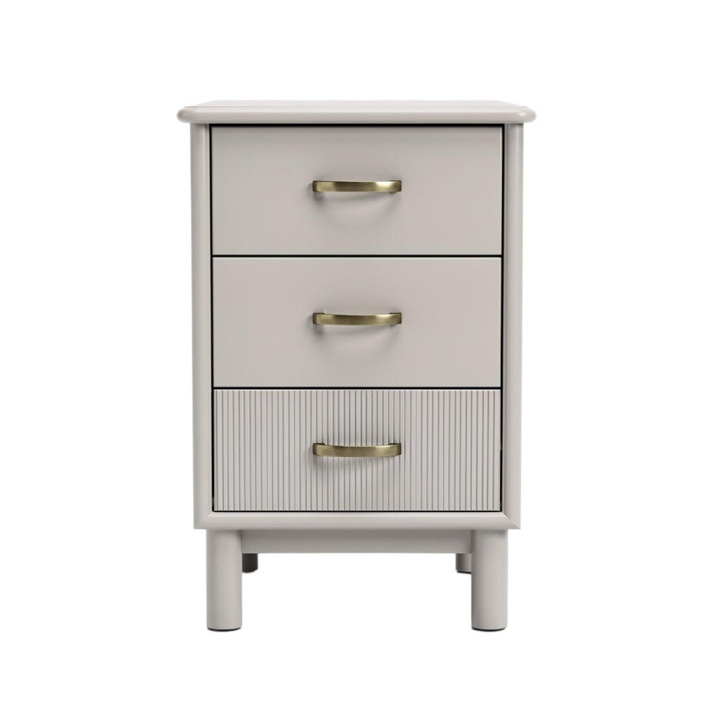 **Commode moderne à trois tiroirs avec poignées dorées**
